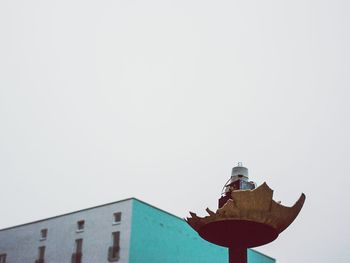 Low angle view of built structure against clear sky
