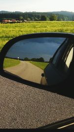 Road passing through field