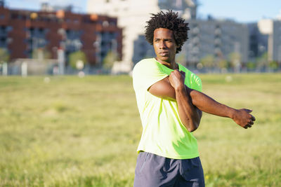 Young man standing on field