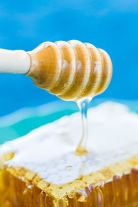 Close-up of hand holding ice cream