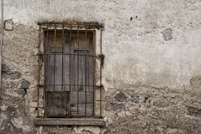 Close-up of window of old building