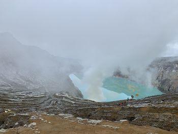 Smoke emitting from volcanic mountain