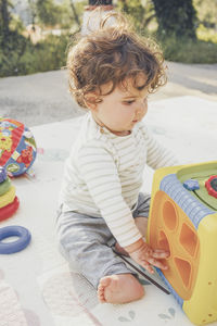 Cute boy playing outdoors