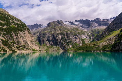 Panoramic view of the gelmer reservoir in switzerland.