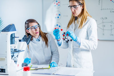 Female scientists working in laboratory