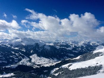 Scenic view of mountains against sky during winter