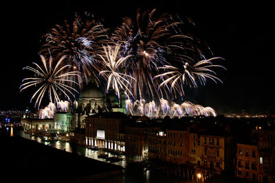 Firework display at night