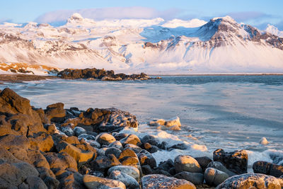 Scenic view of snowcapped mountains against sky