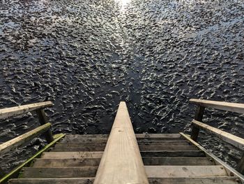 High angle view of ladder on pier