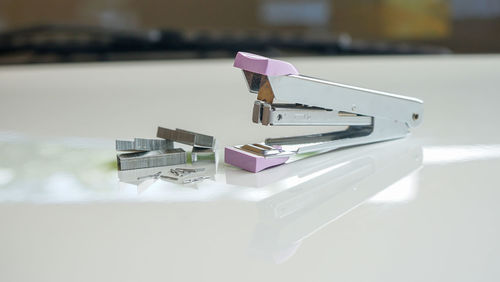 Close up of the stapler on the table