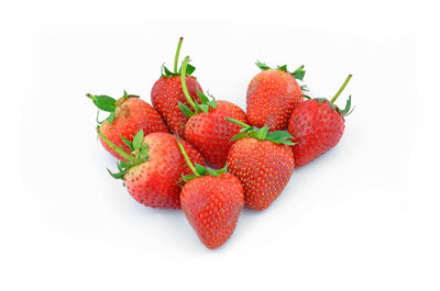 Close-up of strawberry over white background