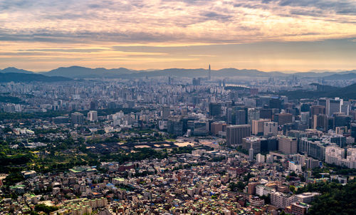 High angle view of townscape against sky during sunset