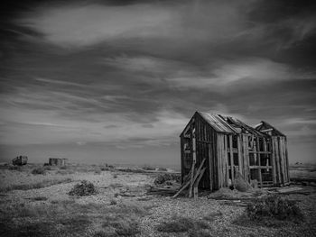 Derelict fisherman's shed, dungeness beach, kent, uk. shot in black and white. 