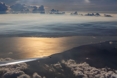 Scenic view of sea against cloudy sky