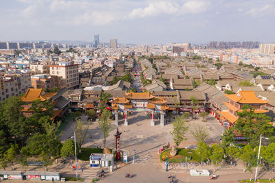 High angle view of street amidst buildings in city