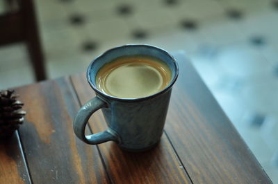 High angle view of coffee cup on table