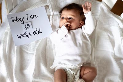 Cute baby boy on bed