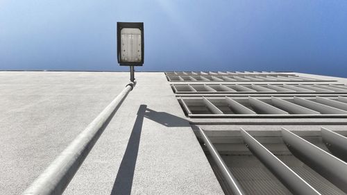 Low angle view of street light against clear sky