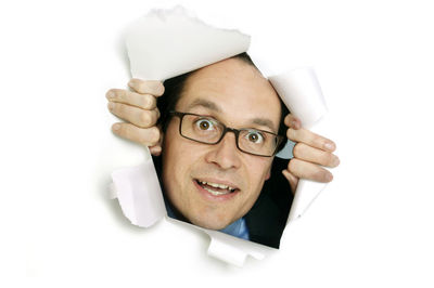 Portrait of woman wearing eyeglasses against white background