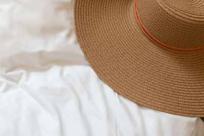High angle view of hat on bed at home