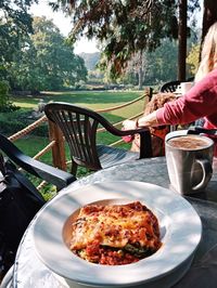 Midsection of woman having food