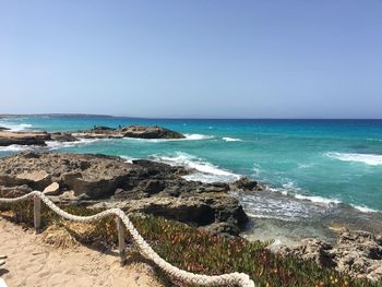 Scenic view of sea against clear sky