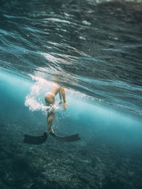 Man swimming in sea