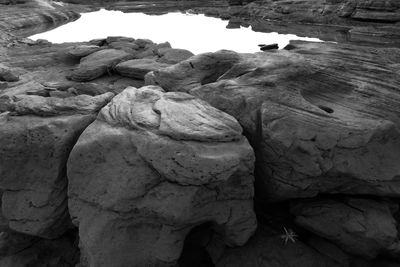 High angle view of rocks on shore