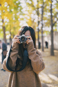 Portrait of man photographing