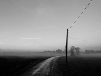 Road amidst landscape against sky
