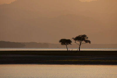 Scenic view of sea against sky during sunset