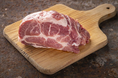 Close-up of bread on cutting board