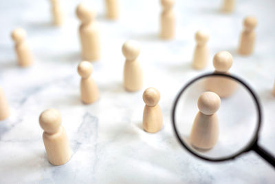 Close-up of chess pieces on table