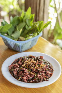 Close-up of salad in bowl on table