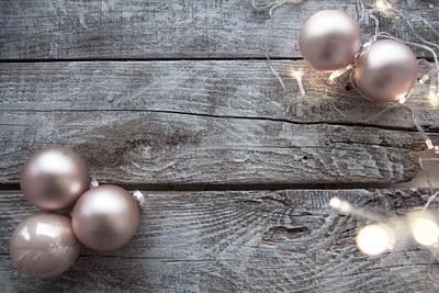 Directly above shot of christmas decorations on wooden table