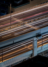 High angle view of light trails on road in city