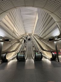 Low angle view of ceiling and escalator in the subway 