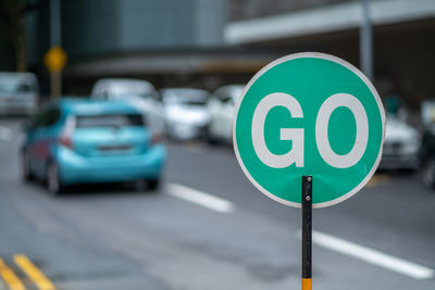 Road sign on street in city