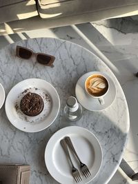 High angle view of coffee cup on table