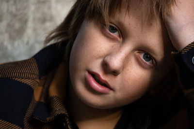 Close-up of young woman looking away