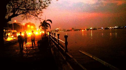 Scenic view of river at sunset