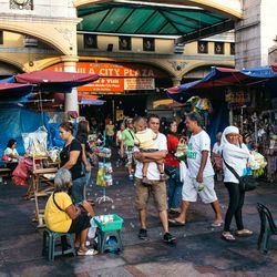 People at market stall