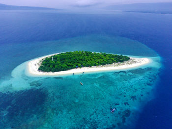 The small island named tabuhan in the beautiful clear waters of the bali straits. banyuwangi.