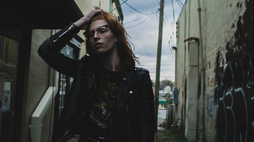 Portrait of young woman looking at camera