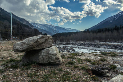 Scenic view of rocky mountains against sky