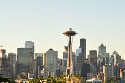 Skyscrapers in city against clear sky