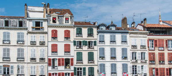 Low angle view of residential buildings against sky