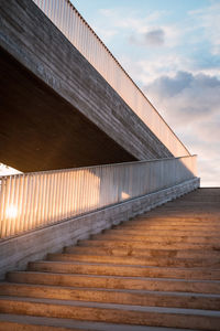 Low angle view of bridge against sky during sunset