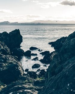 View of rock formation in sea