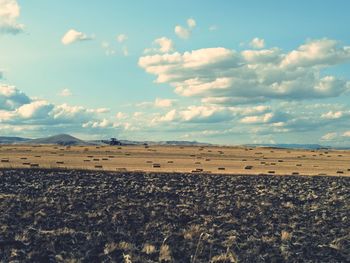 Scenic view of desert against sky